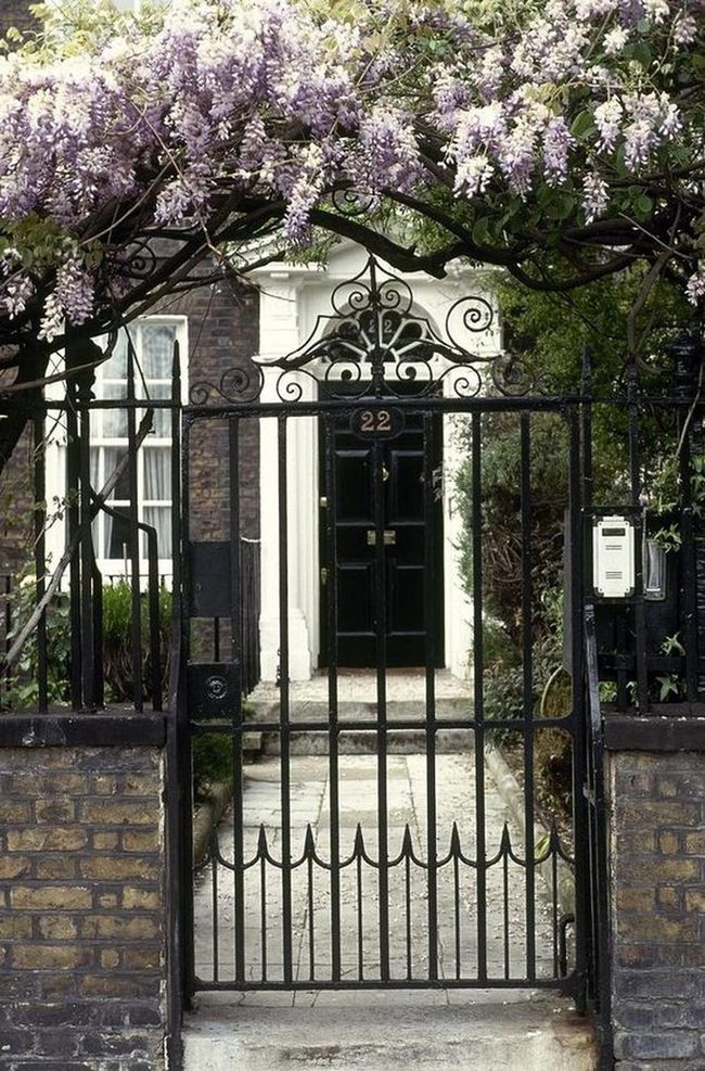 Purple Wisteria Gates White Pillars