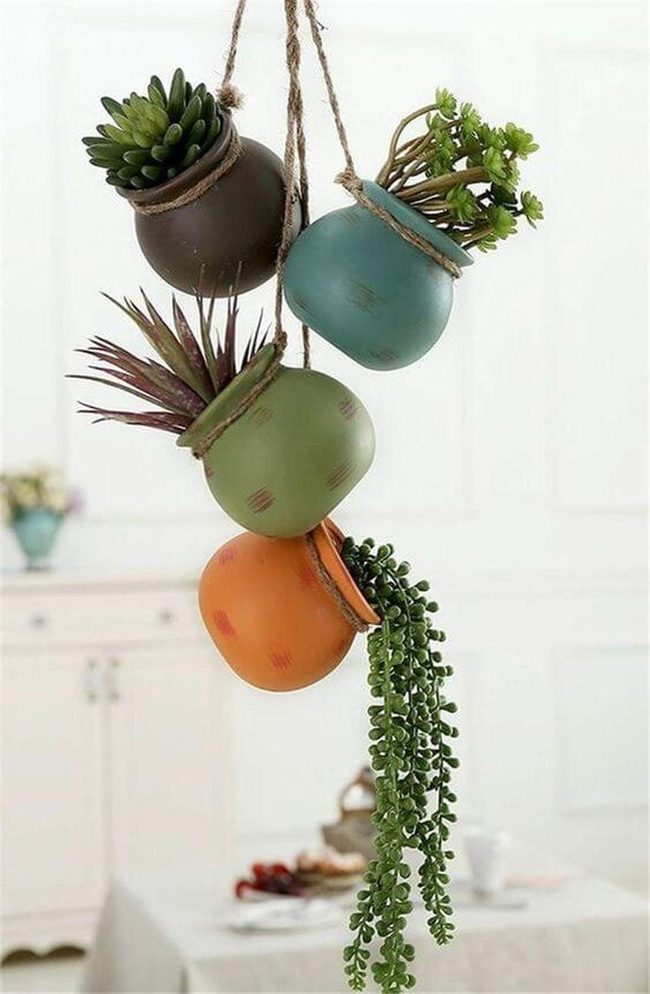 Colorful Hanging Planters In Motion