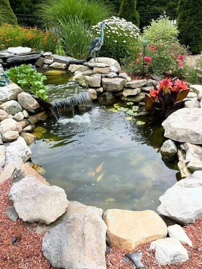 Cascading Stone Pond With Glowing Water