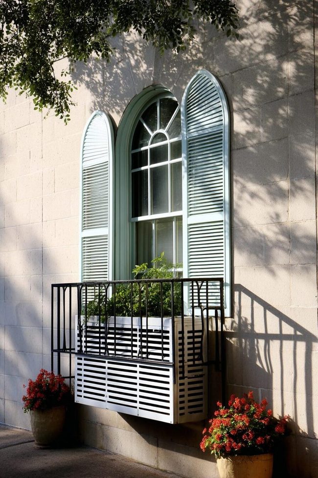 Salvaged Window Frames Hide Equipment