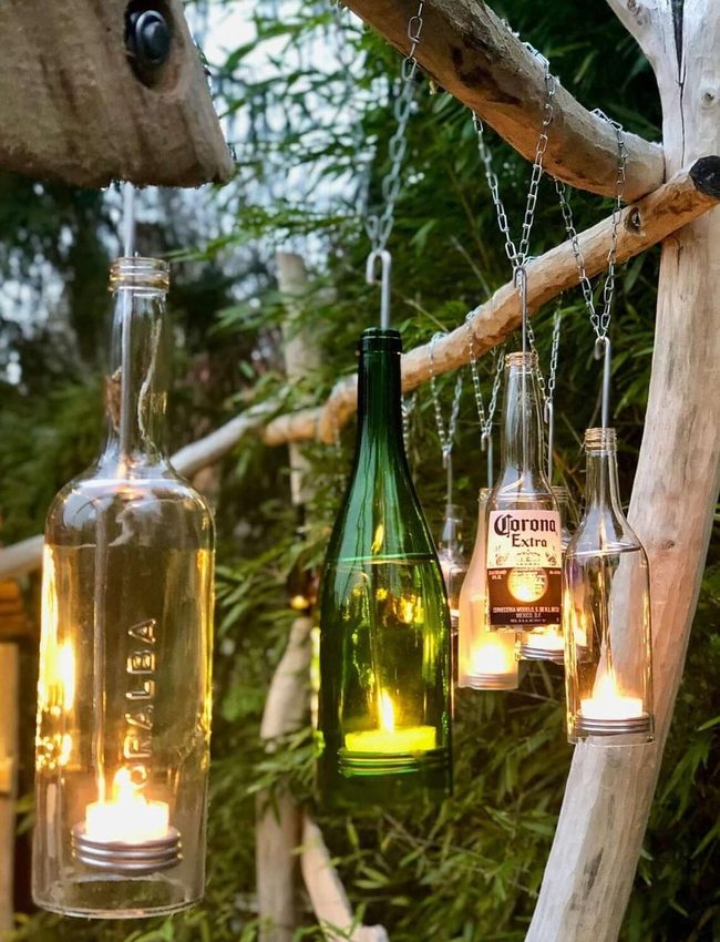 Hanging Glass Bottles With Candlelight