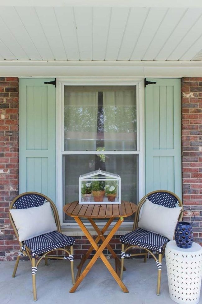 Iron Hinges Meet Pale Green Shutters