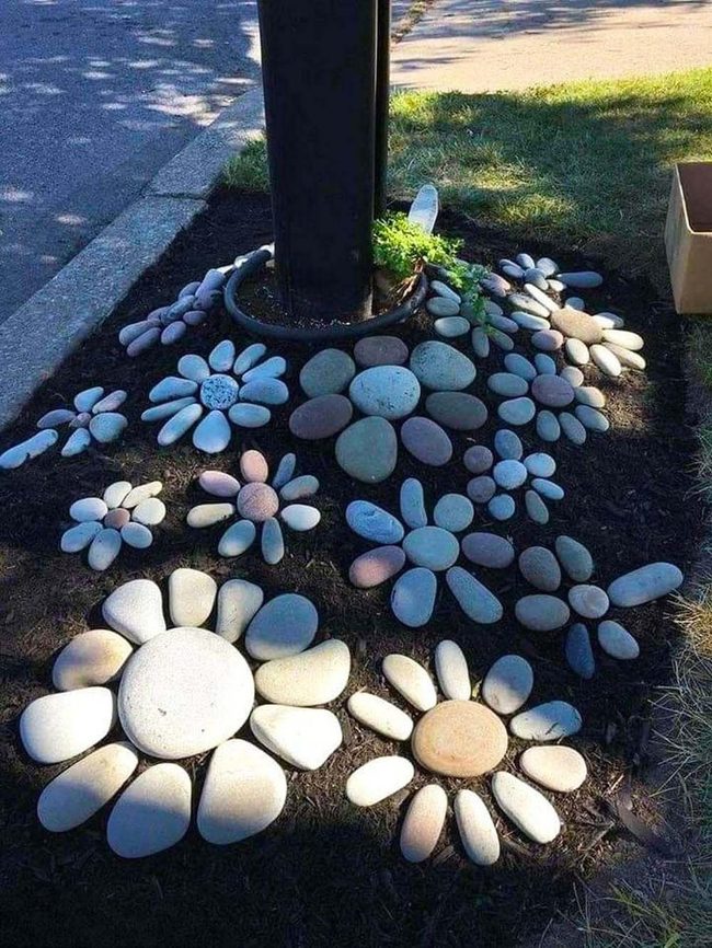 Stone Flowers Around Street Light