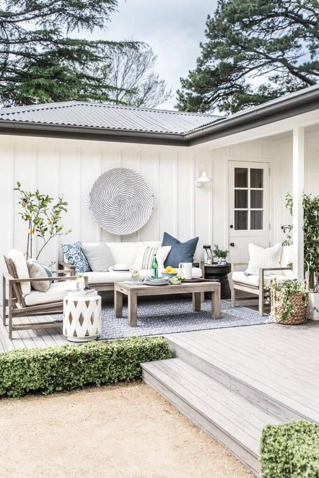 Woven Rugs And Wooden Seating