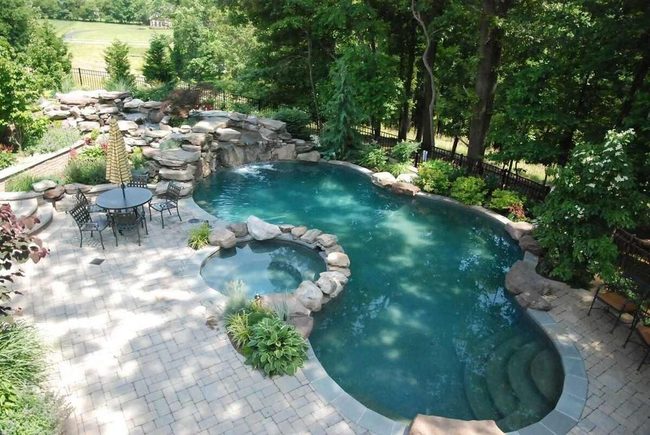 Poolside Dining With Lush Greenery