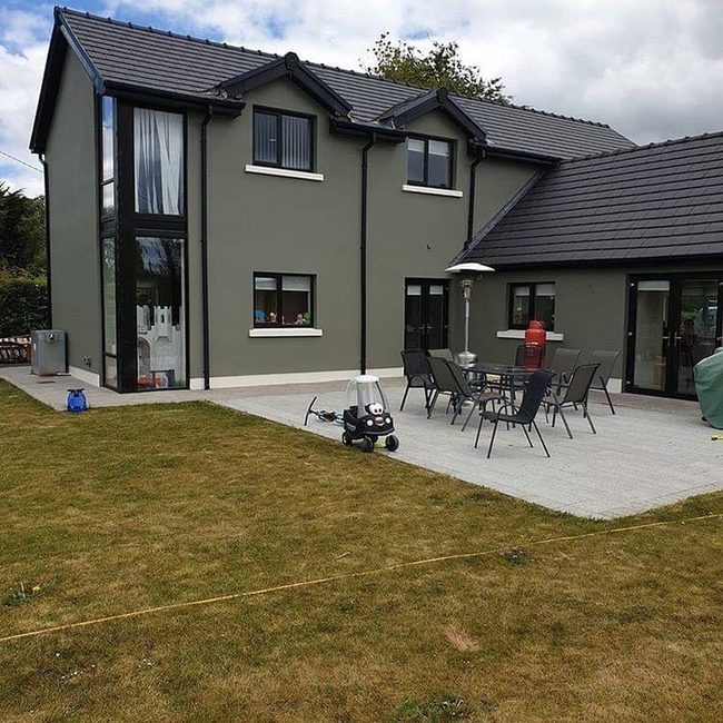 Green Exterior With Black Roof