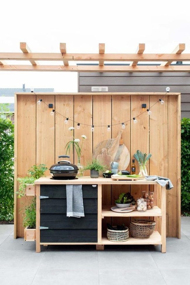 Wooden Outdoor Kitchen With String Lights