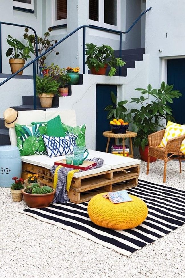 Yellow Poufs And Striped Ground