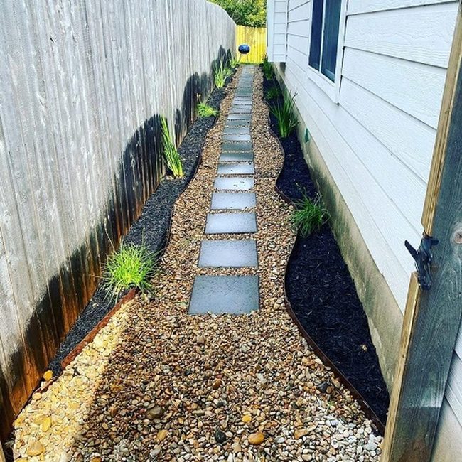 Brown Gravel Pathways Through Desert Plants