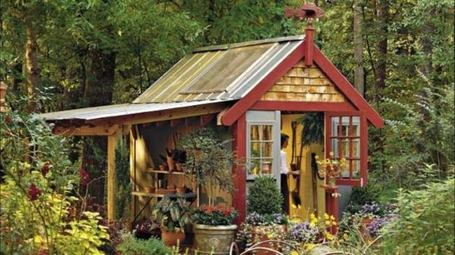 Red-Roofed Garden Shed Among Trees