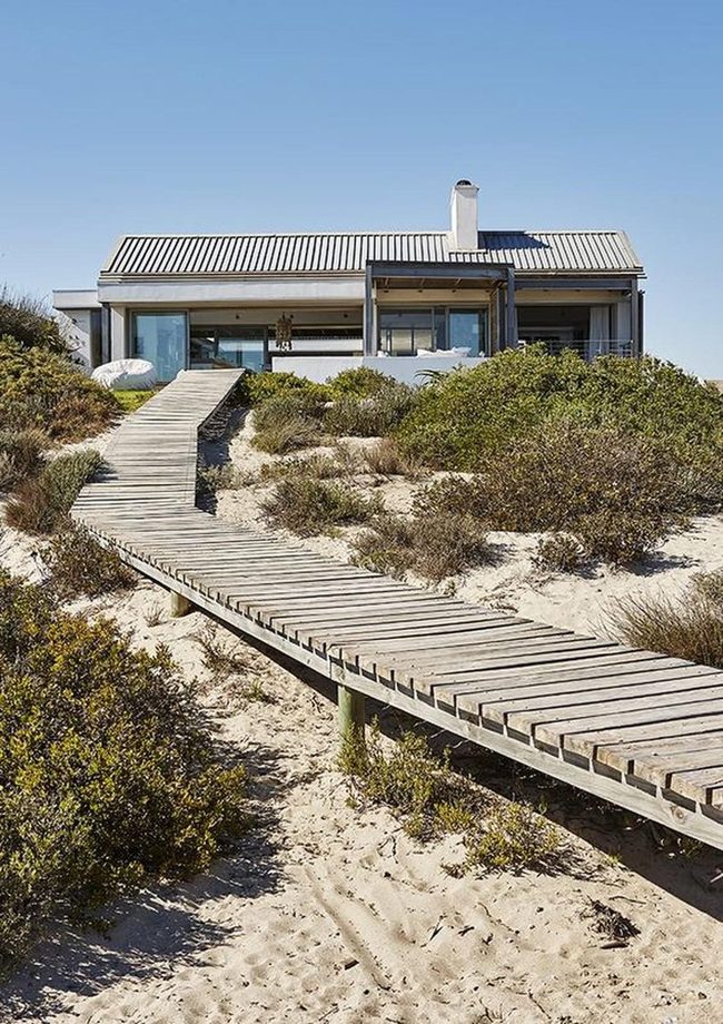 Glass Walls Meet Golden Dunes