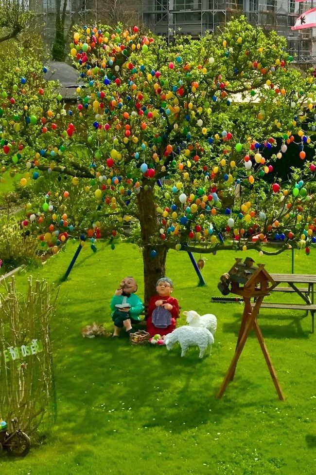 Colorful Eggs Dancing Through Branches