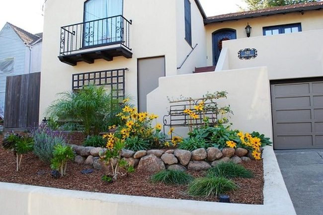 Golden Coneflowers And Stone Borders