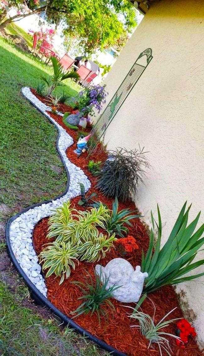 Red Mulch Garden With Stone Pathways