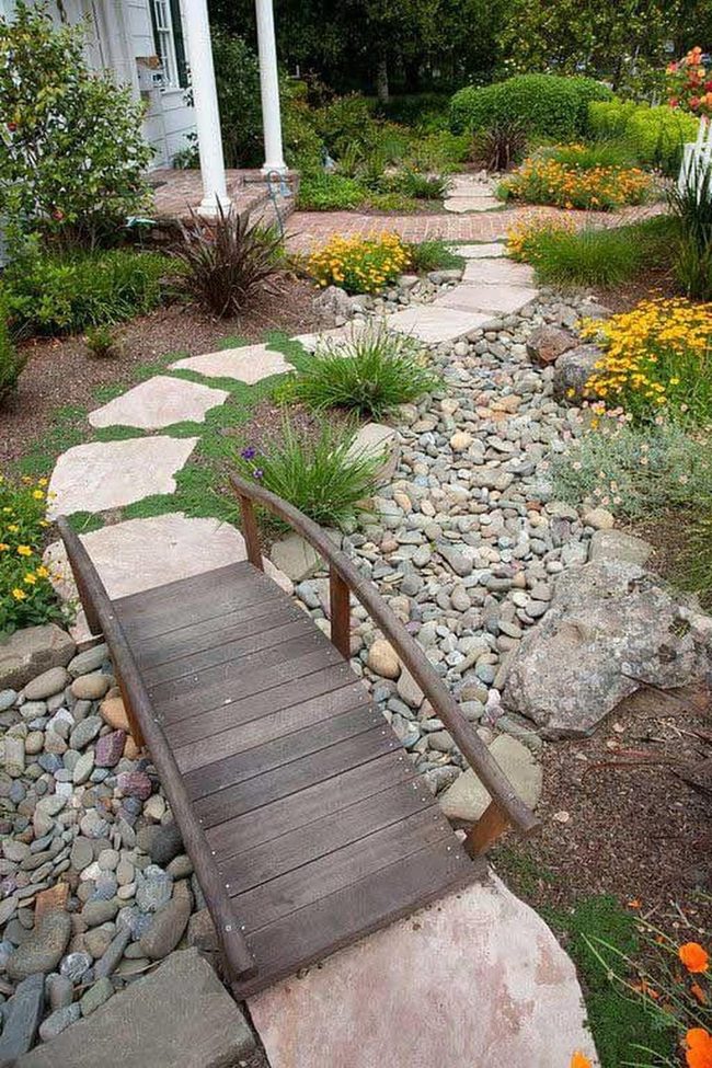 Stone Path Through Flowering Garden