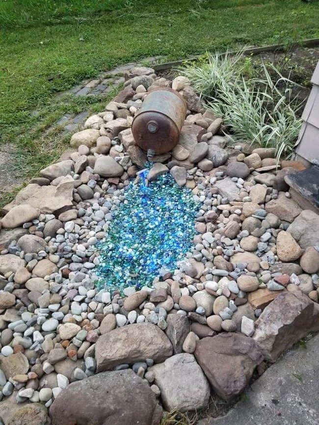 Spilling Glass Stones Over Pebbles