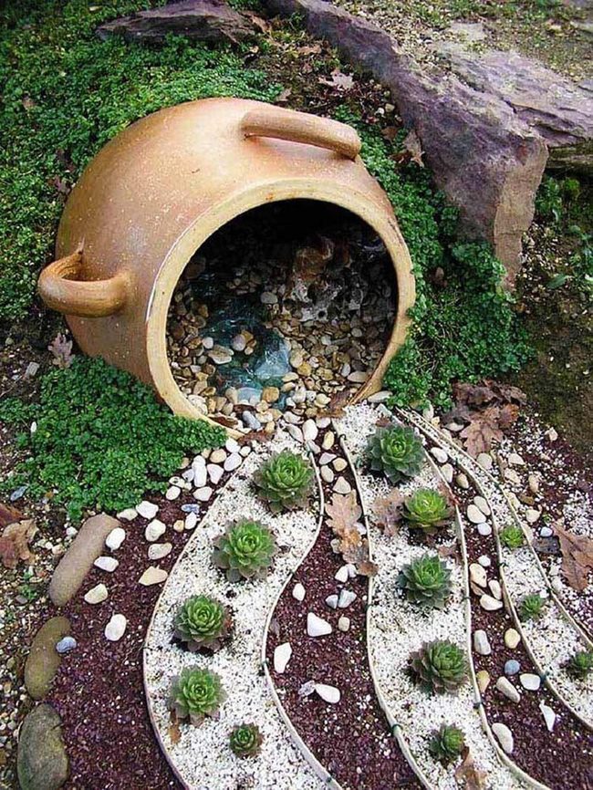 Colorful Succulents Against Pale Stone