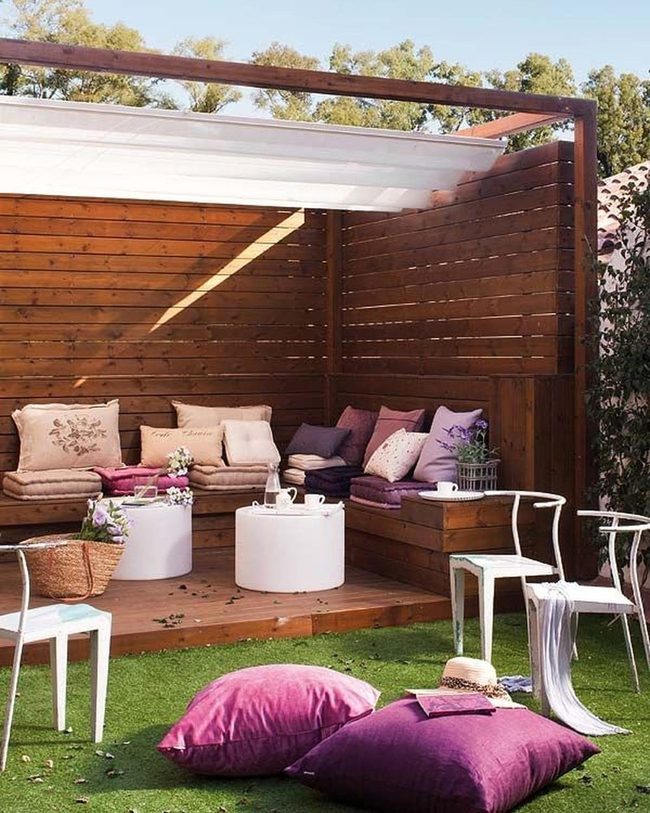 Purple Cushions Green Grass Wooden Deck