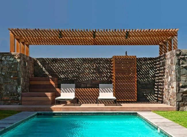Wooden Pergola Shadowed Poolside Retreat