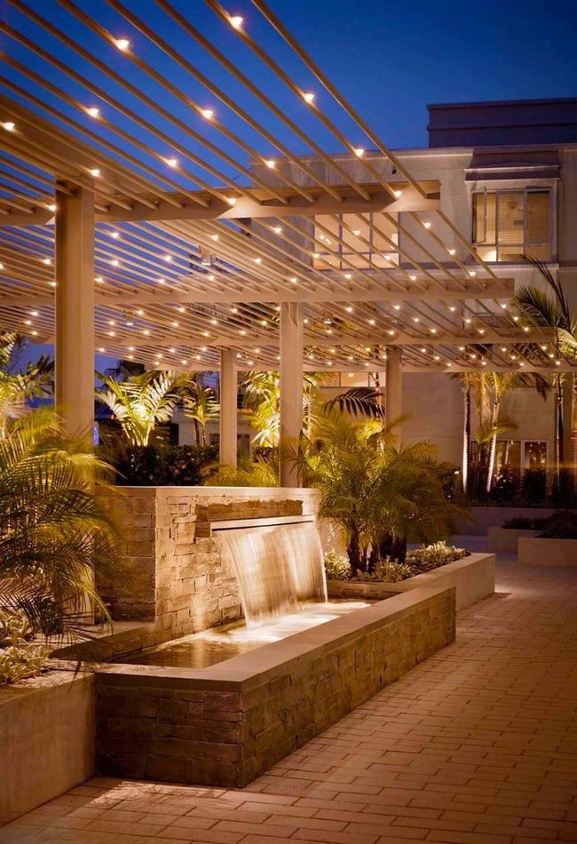 Tropical Backyard With String Lights