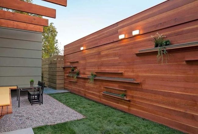 Cascading Plants Transform Fence Into Garden