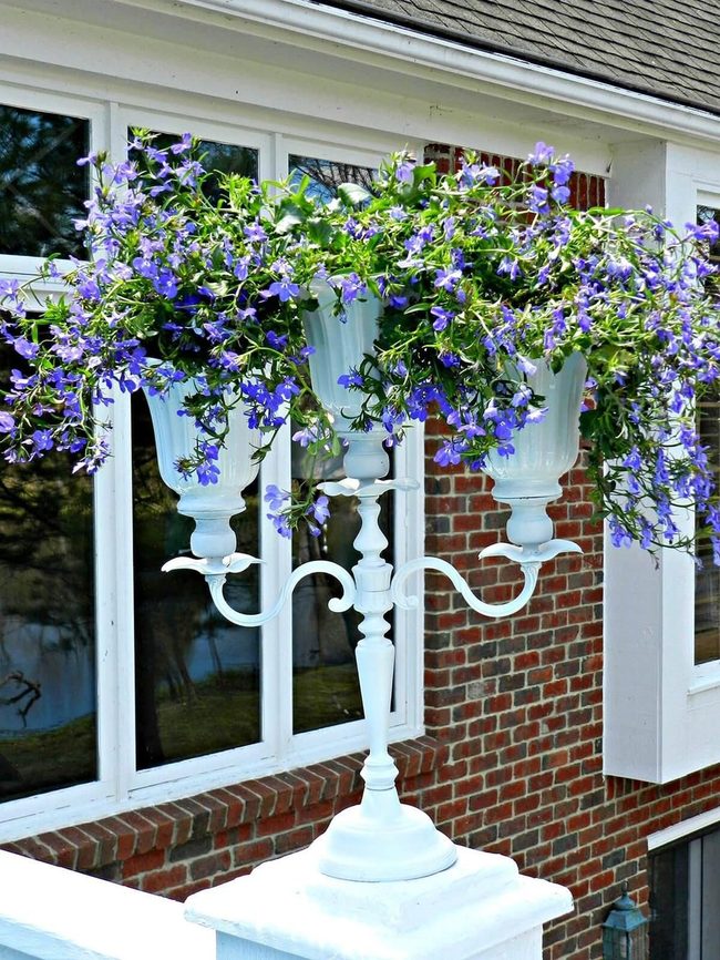 White Candelabra Planters With Blooms