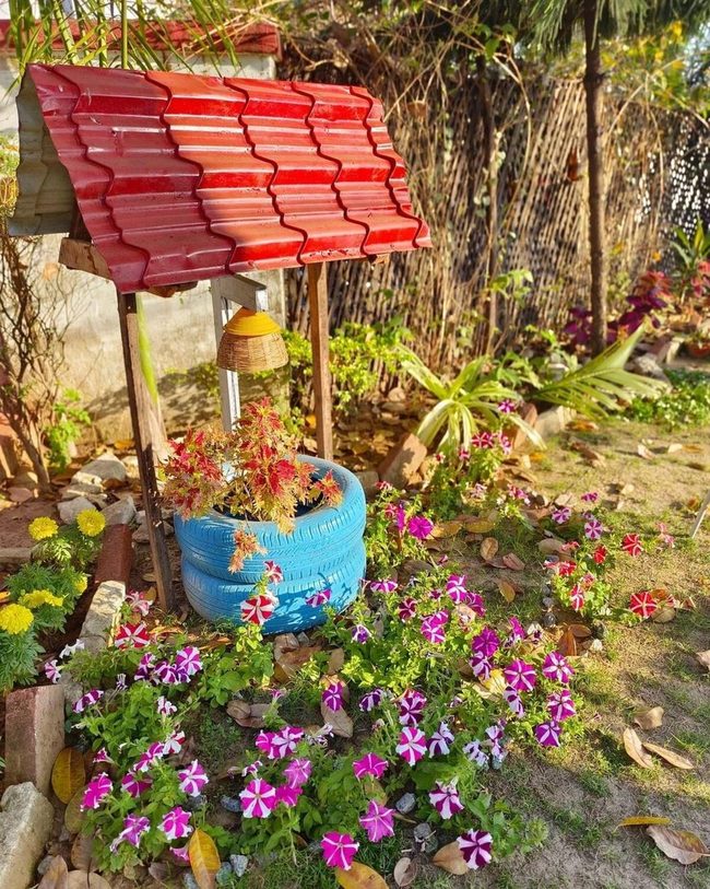 Stacked Tires Into Blooming Well