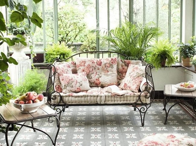 Sunlit Floral Sunroom With Iron Details