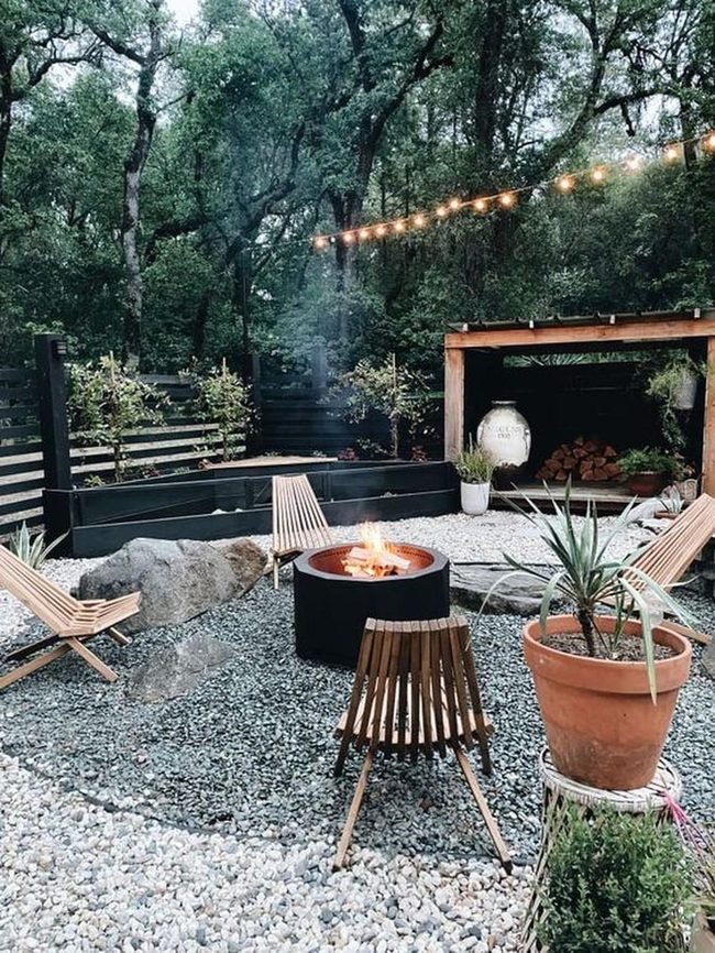 Firelit Gathering Space With Natural Stone