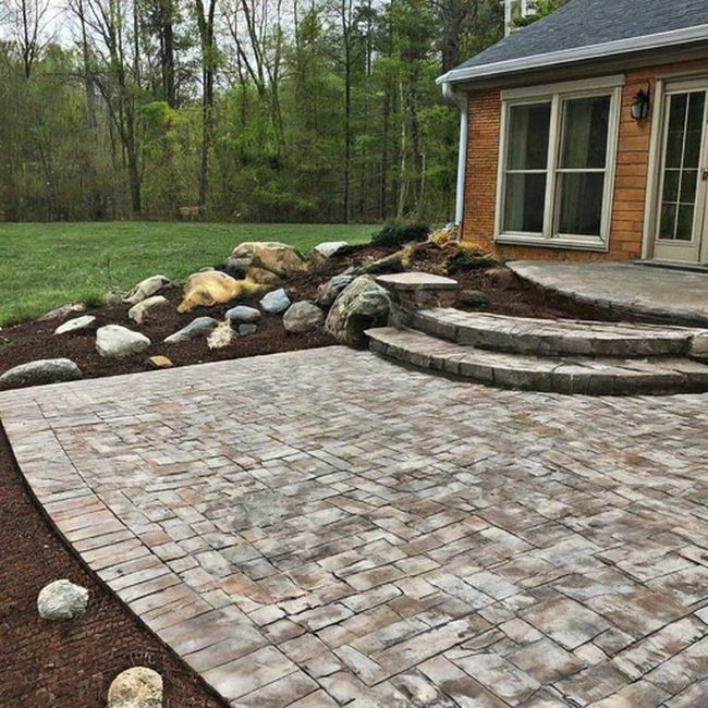 Gray Pavers Surrounding Nature-Inspired Stone Yard