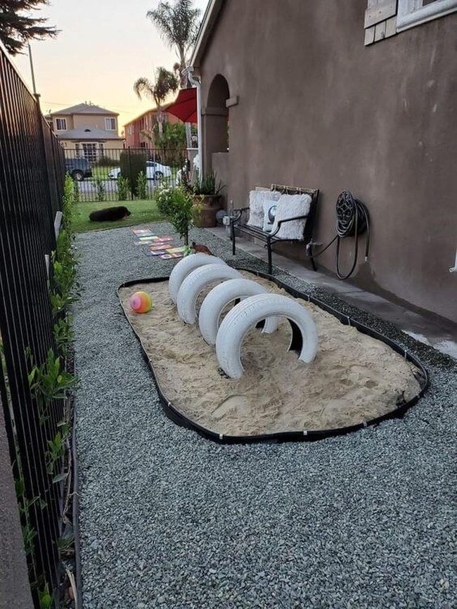Sandy Dog Playground With Tire Tunnels