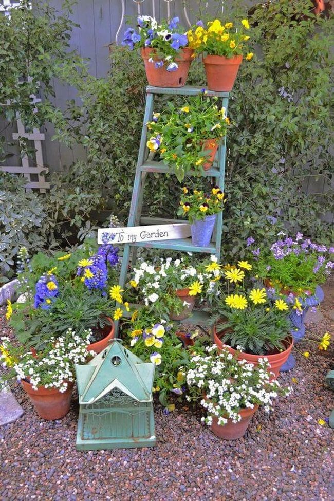 Stacked Pots Burst With Blooms