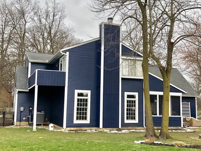 Deep Navy Home With White Trim