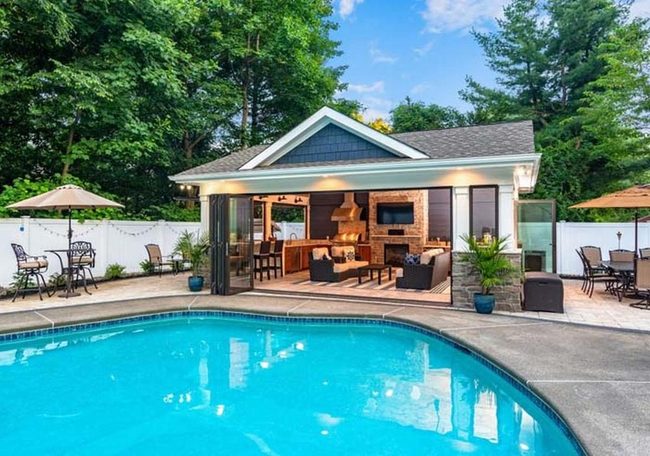 Glass Cabana With Built-In Fireplace