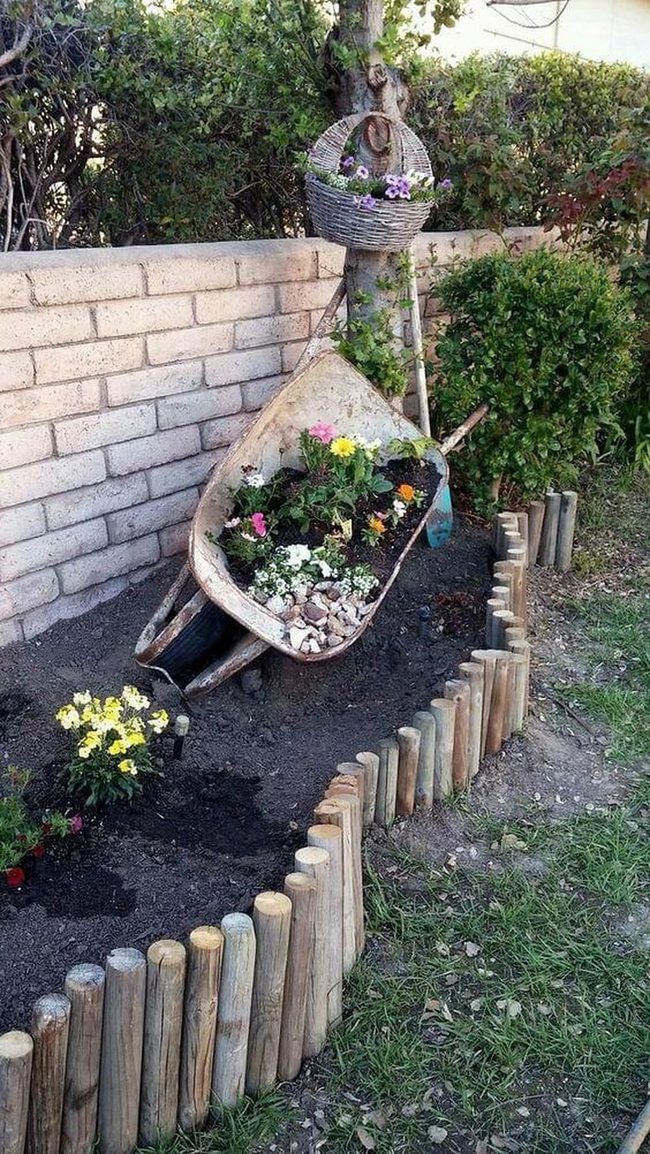 Wheelbarrow Bursting With Garden Blooms