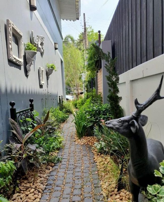 Dark Deer Among Vibrant Greens