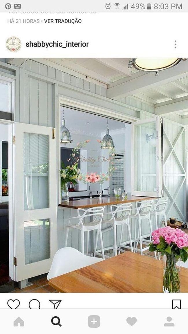 Light Wood Bar, Fresh Flowers, White Stools