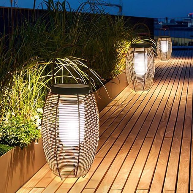 Metal Lanterns Illuminating Polished Wood Deck