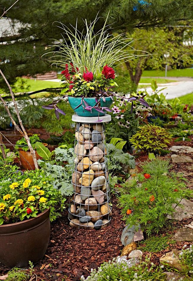 Colorful Planters On Stone Pillars