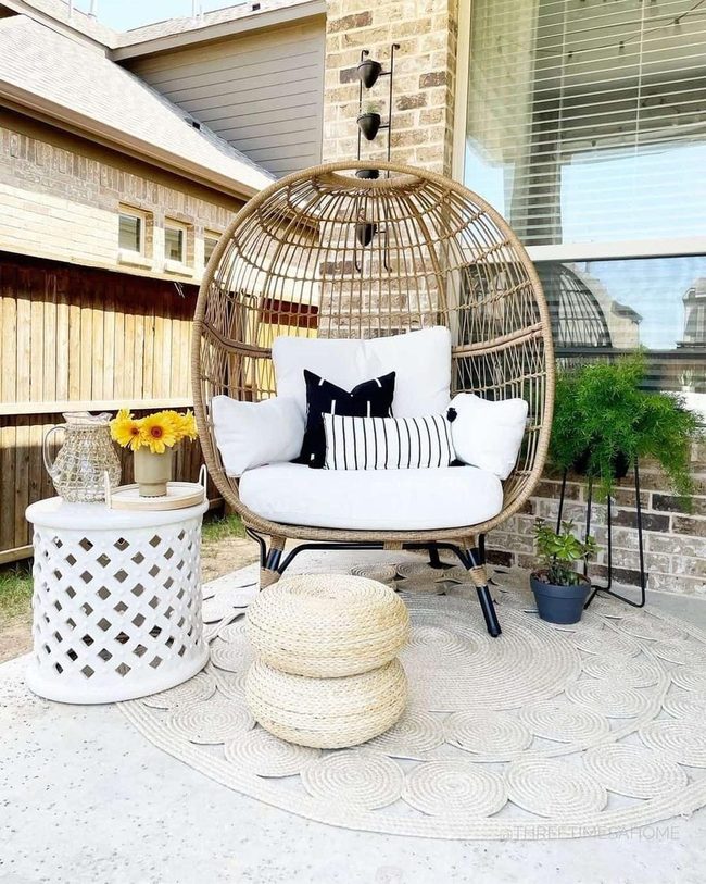 Wicker Chair With Sunflowers And Greenery