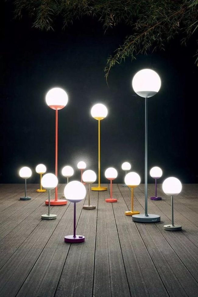 Glowing Glass Orbs Colorful Stands