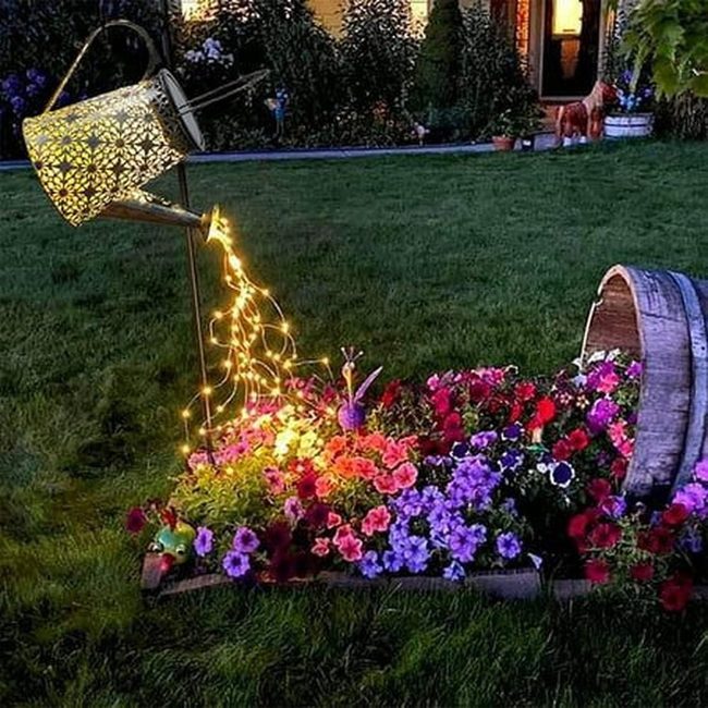 Watering Can Pours Glowing Flowers