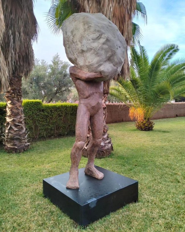 Stone Figure With Raw Boulder Base