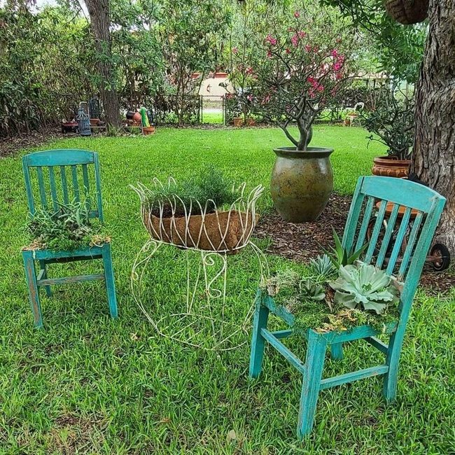 Weathered Chairs Blooming Garden Planters