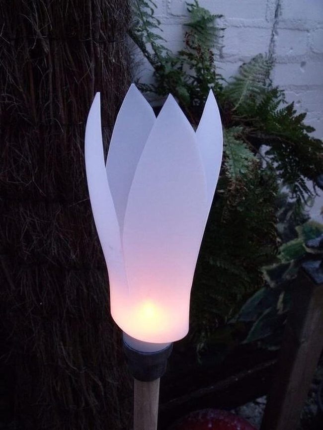 Petal-Shaped Garden Torches Illuminate