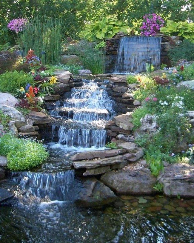 Layered Stone Waterfall With Purple Blooms