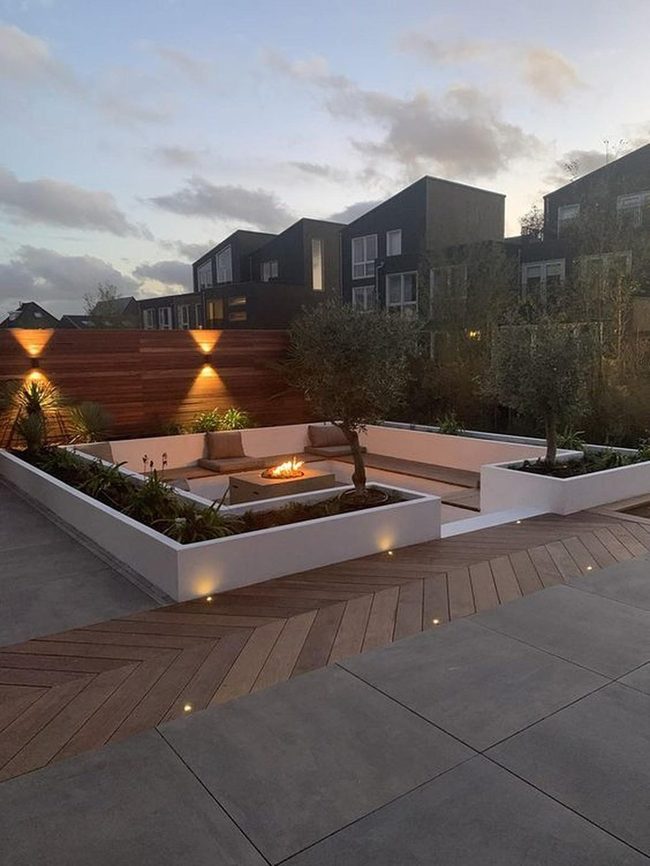 Firelit Gathering Space With Stone