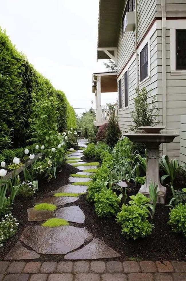 Cream House With Moss Stone Path