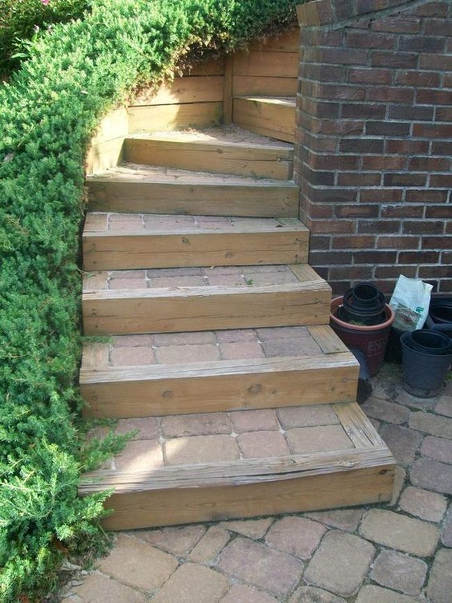 Natural Wood Steps Through Green Garden