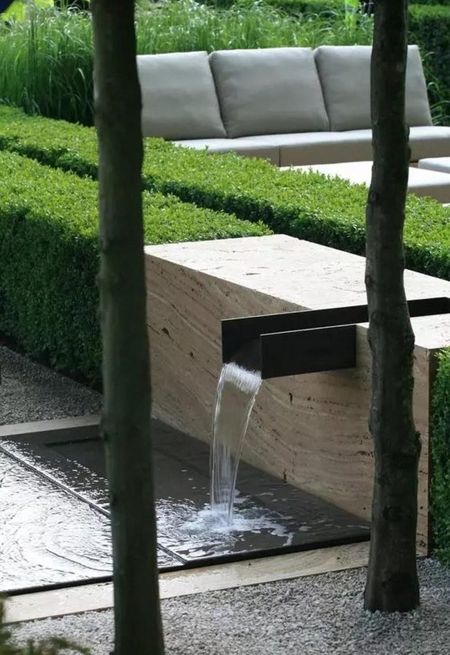 Black Spout Fountains And Stone Basins